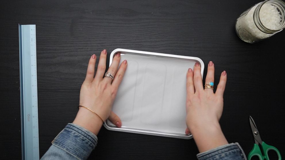 PHOTO:  Line a baking sheet with parchment paper.