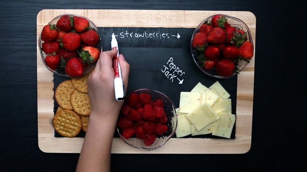 PHOTO: Writing on the chalkboard tray.