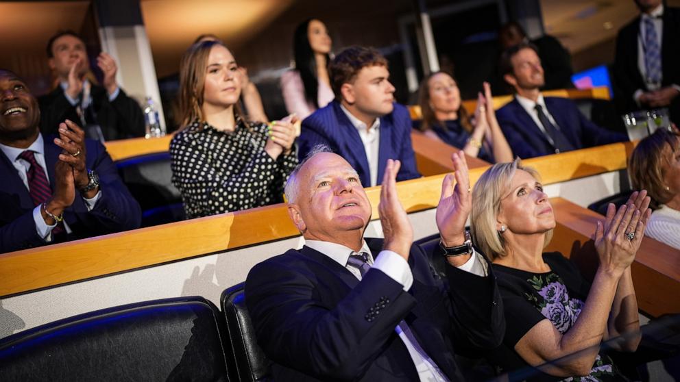 PHOTO: Democratic vice-presidential candidate Minnesota Gov. Tim Walz and Minnesota First Lady Gwen Walz sit with their children Hope and Gus at the Democratic National Convention, Aug. 19, 2024, in Chicago.