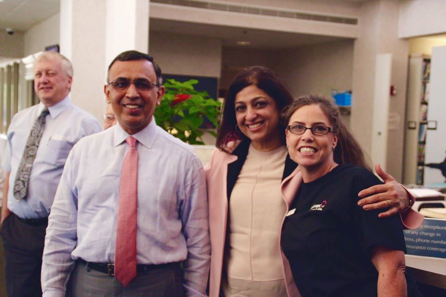 PHOTO: Dr. Omar Atiq, far left, an oncologist, forgave his patients' around $650,000 medical debt.