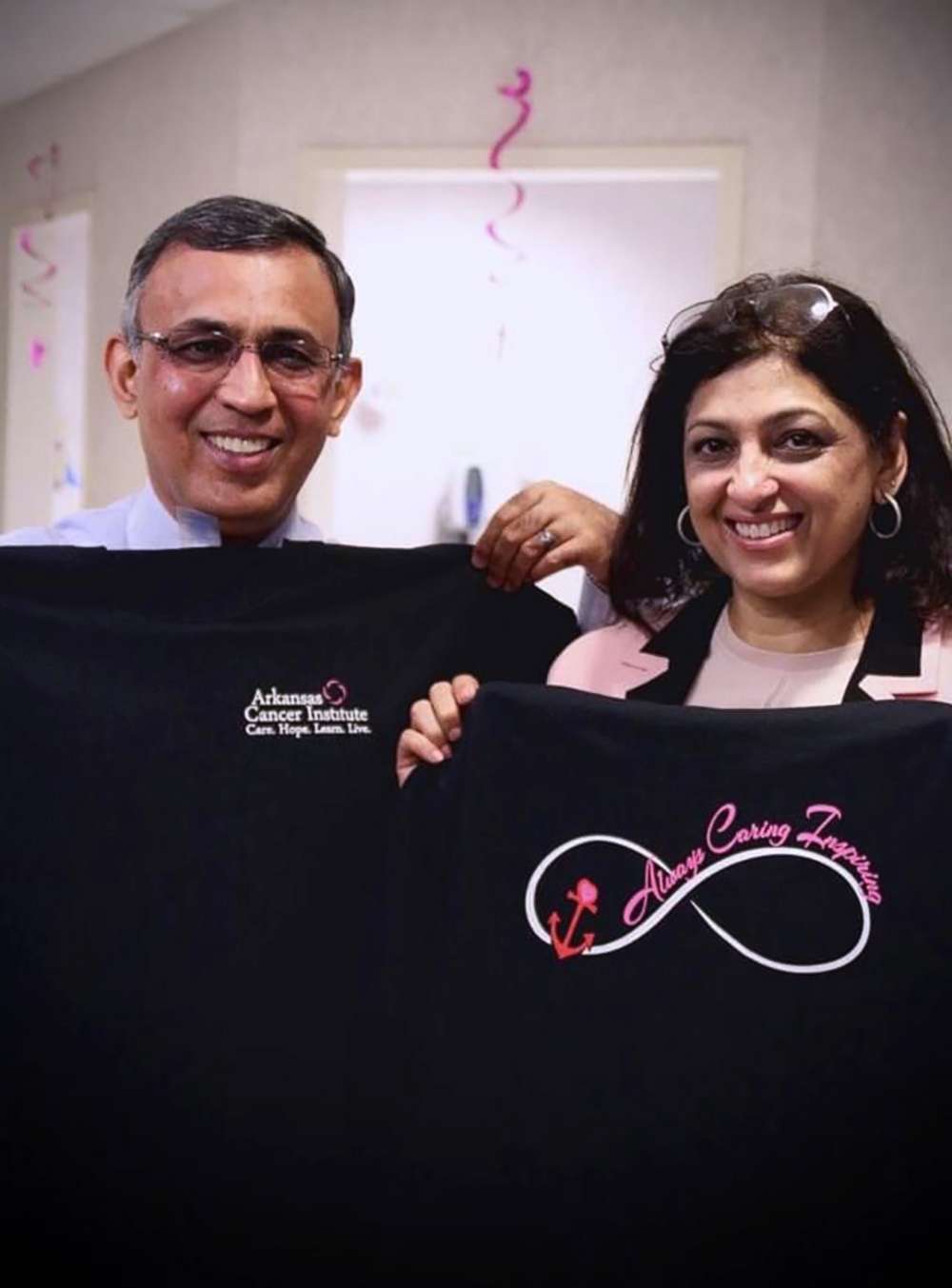 PHOTO: Dr. Omar Atiq, an Arkansas-based oncologist, poses with his wife Mehreen.