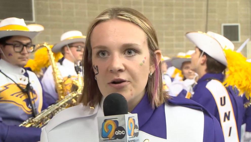 PHOTO: Gabi Riessen plays the cymbals in the University of Northern Iowa Panther Marching Band.