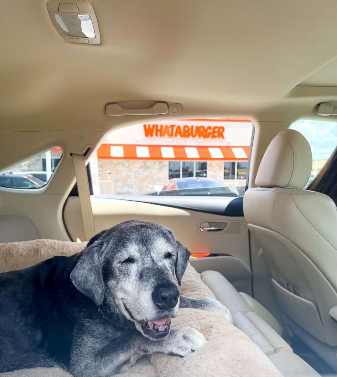 PHOTO: One of Annie's bucket list items was a hamburger tour. Here, Annie is pictured outside a Whataburger location on just one of her tour stops.