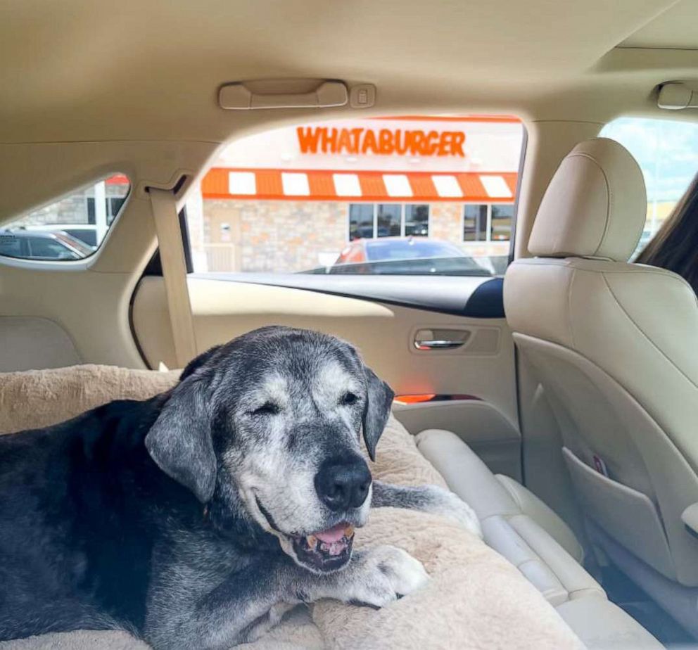 PHOTO: One of Annie's to-do list items was a round of burgers.  Here Annie is pictured outside a Whataburger location during just one of her tour stops.