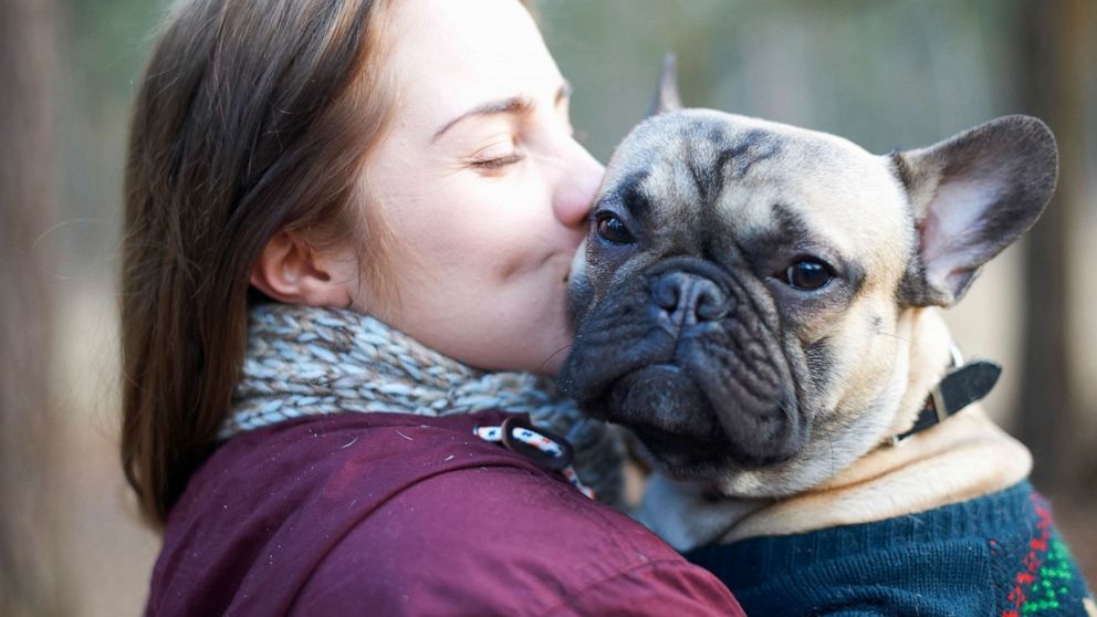 PHOTO: In this undated file photo, a woman gives her dog a kiss.