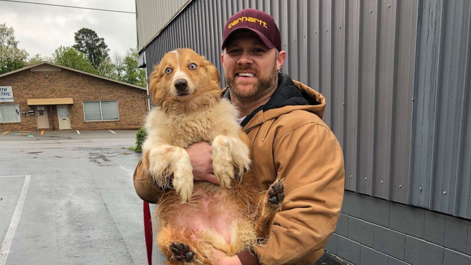 PHOTO: Eric Johnson, 37, reunited with miniature Australian Shepherd, Bella, who was lost during the category 4 tornado that hit Cookeville, Tenn. on May 3, 2020.