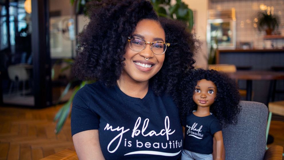 PHOTO: The founder of toy company Healthy Roots Dolls, Yelitsa Jean-Charles, poses alongside the doll,"Zoe."