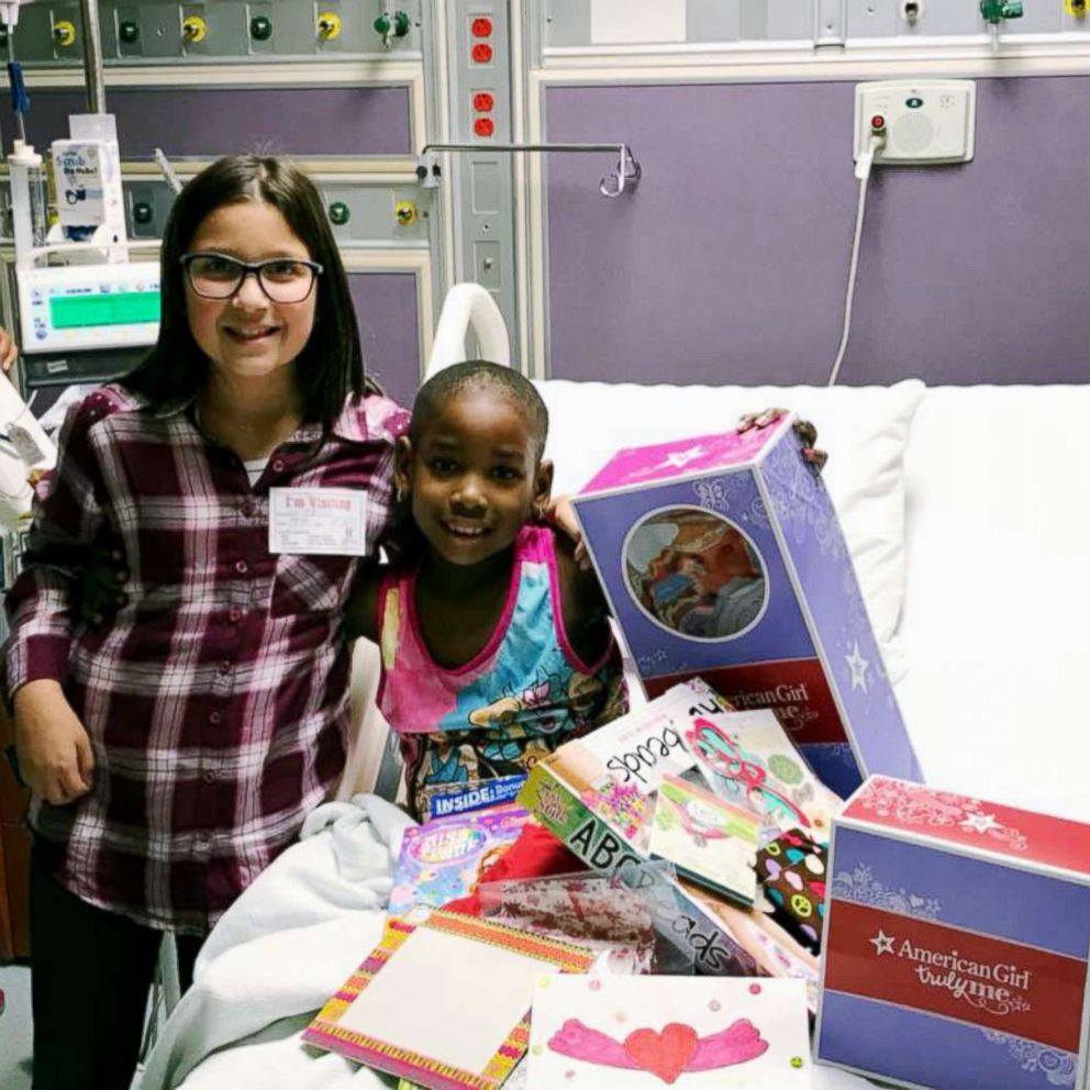 VIDEO: Girl gifts bald American Girl dolls to children with cancer
