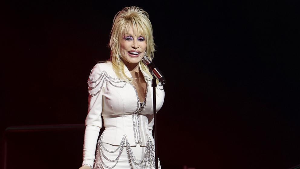 PHOTO: Dolly Parton speaks onstage during Kicking Off CMA Fest: A Special Conversation With Dolly Parton Hosted By Rachel Smith at Music City Center, June 6, 2024, in Nashville, Tenn.