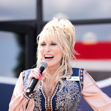 PHOTO: Dolly Parton speaks to the crowd during the grand opening of Dolly's Tennessean Travel Stop in Cornersville, Tennessee, June 24, 2026.