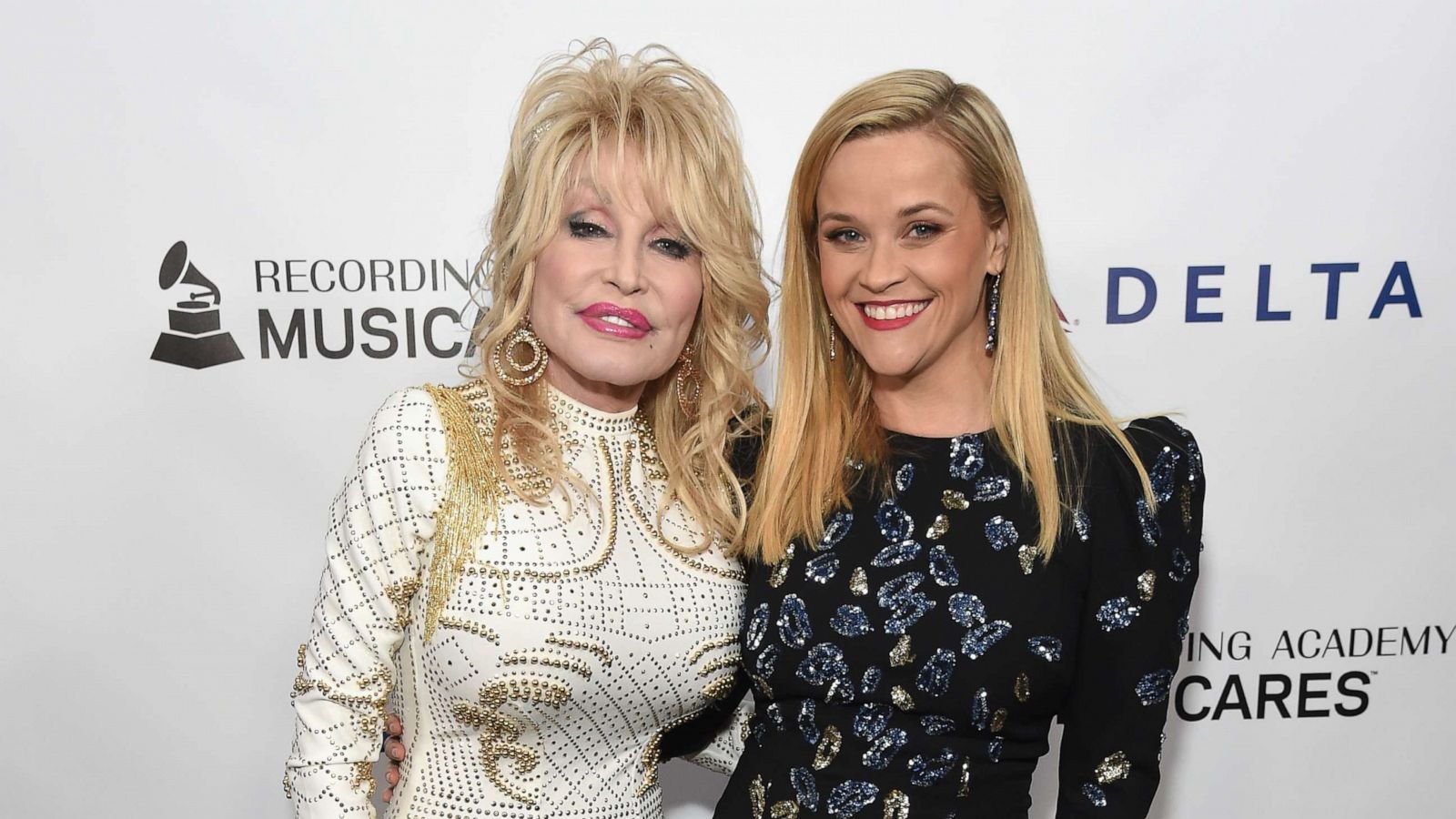 PHOTO: In this Feb. 8, 2019 file photo Dolly Parton and Reese Witherspoon at the Los Angeles Convention Center in Los Angeles.