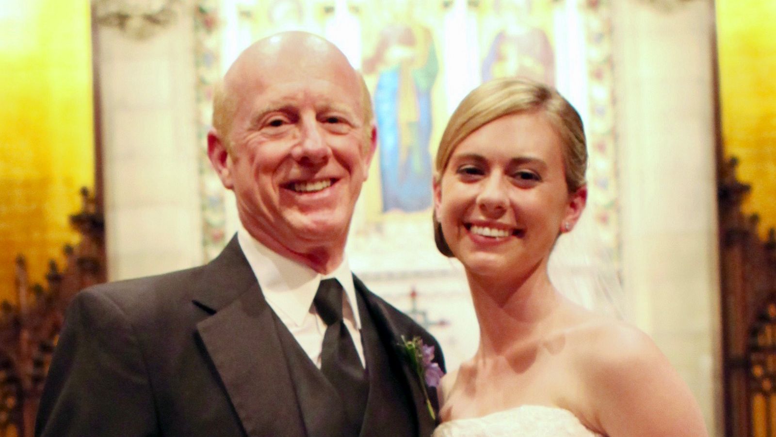 PHOTO: Donald Adair poses with his daughter Abby Adair Reinhard on her wedding day.