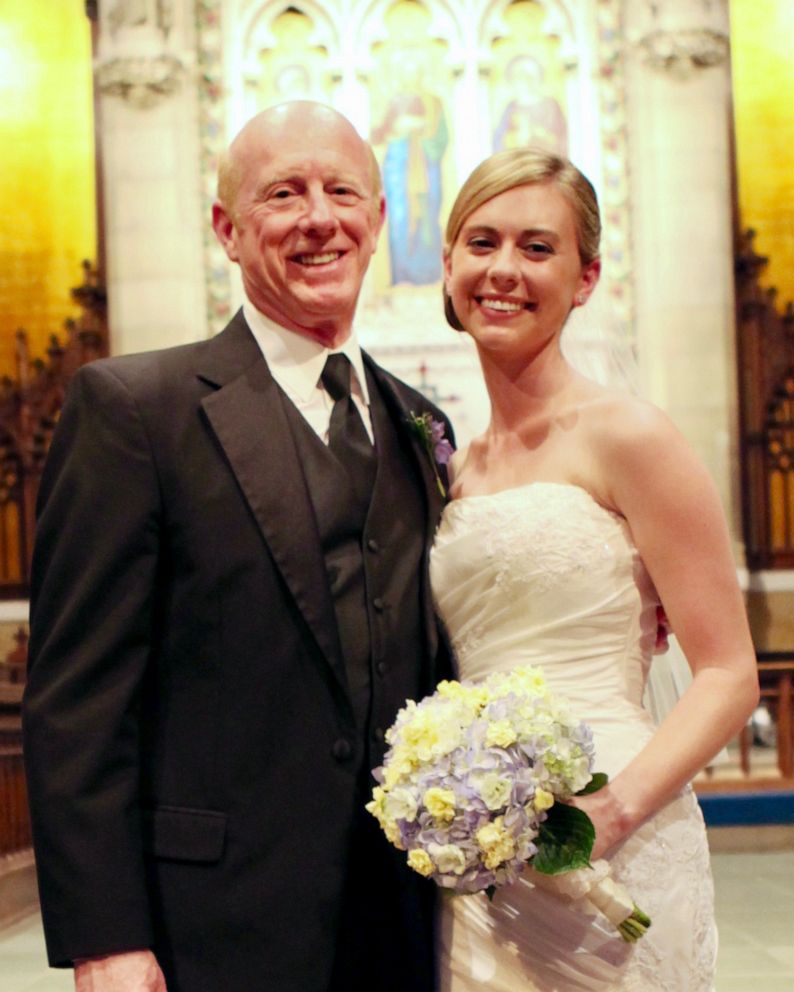 PHOTO: Donald Adair poses with his daughter Abby Adair Reinhard on her wedding day.