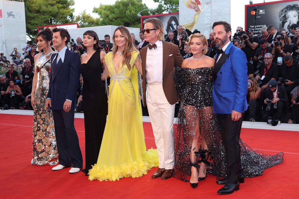 PHOTO: Gemma Chan, Harry Styles, Sydney Chandler, director Olivia Wilde, Chris Pine, Florence Pugh and Nick Kroll attend the "Don't Worry Darling" red carpet at the 79th Venice International Film Festival on Sep. 5, 2022, in Venice, Italy.