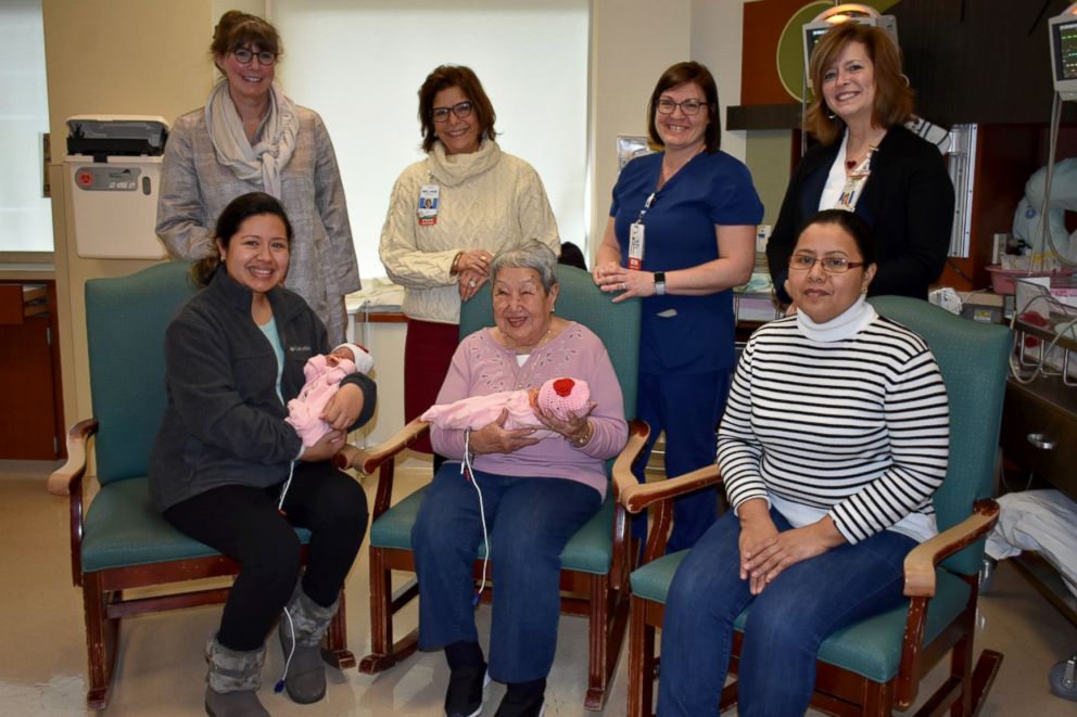 PHOTO: Doris Bender, seated center, poses with a new mom and the nursing leadership at Meritus Medical Center.
