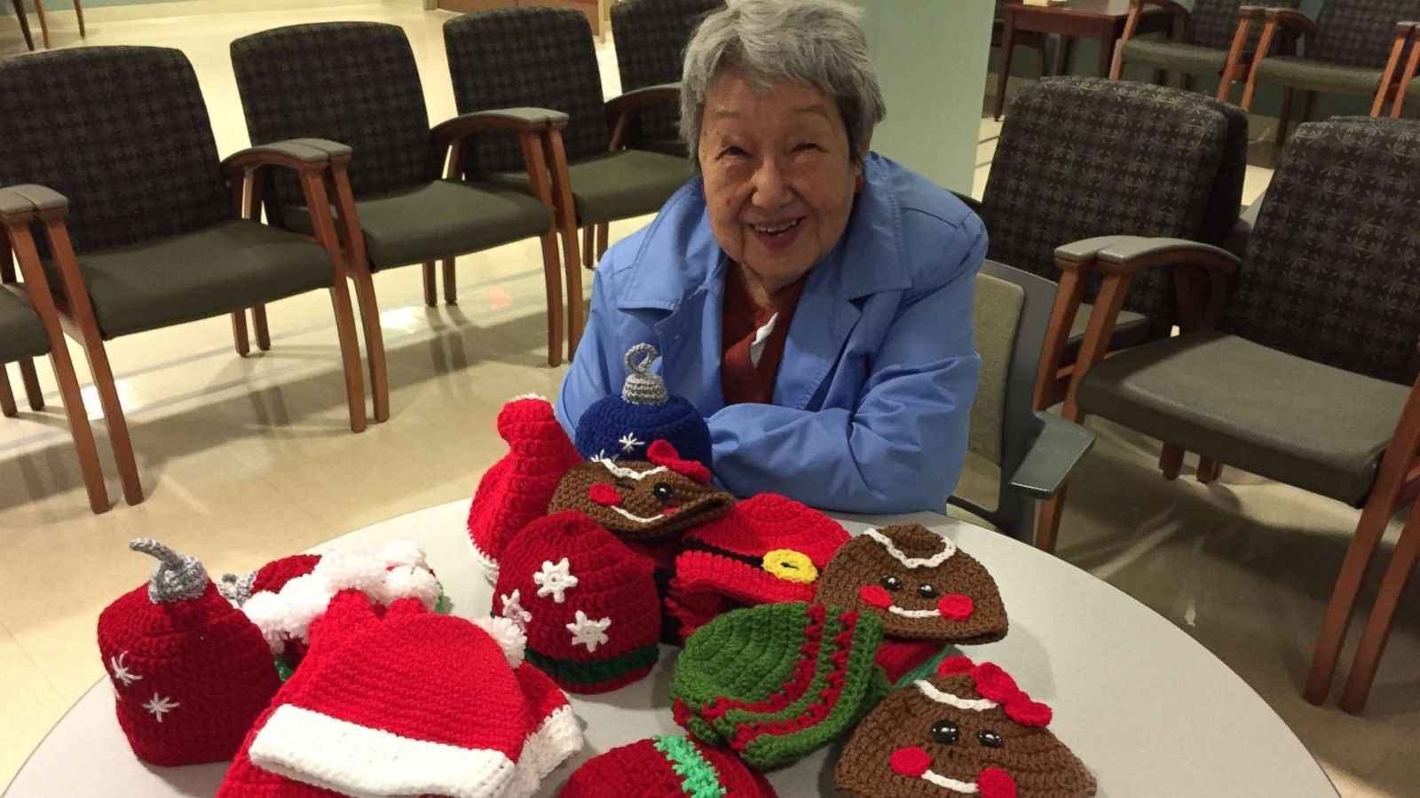 PHOTO: Doris Bender, of Sharpsburg, Maryland, poses with newborn hats she crocheted.