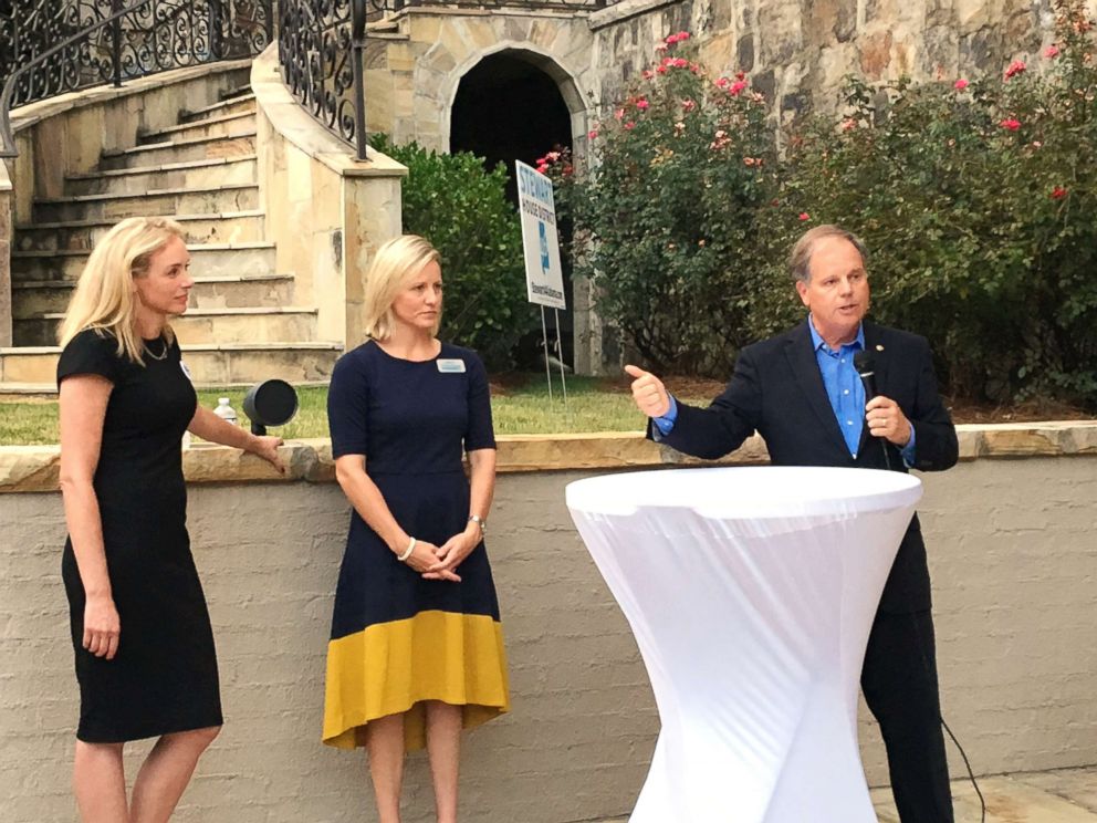 PHOTO: Felicia Stewart and Alli Summerford appear at an event with Alabama Sen. Doug Jones.