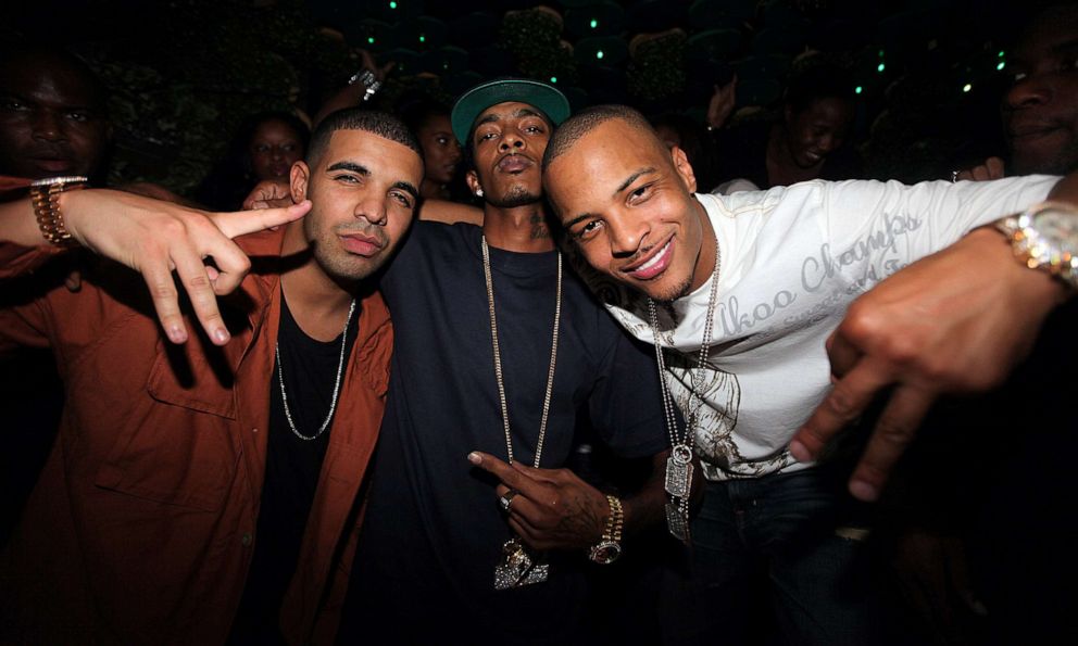 PHOTO: From left, Drake, Nipsey Hussle and TI visit Greenhouse on Aug. 24, 2010 in New York City.