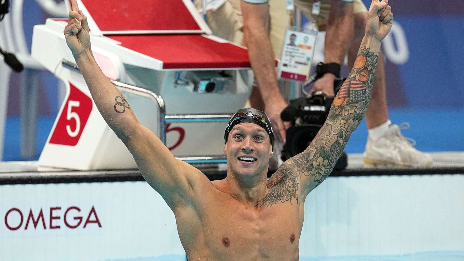 PHOTO: MCaeleb Dressel reacts after winning the gold medal on the Men's 100m Freestyle Final during the Swimming events of the Tokyo 2020 Olympic Games at the Tokyo Aquatics Centre in Tokyo, Japan, July 29, 2021.