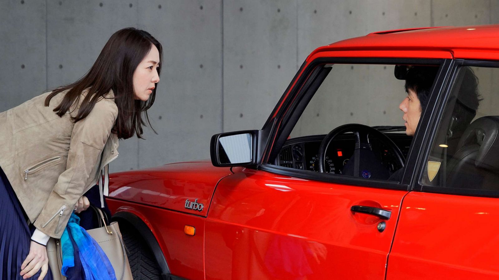 PHOTO: Reika Kirishima and Hidetoshi Nishijima in a scene from "Drive My Car."