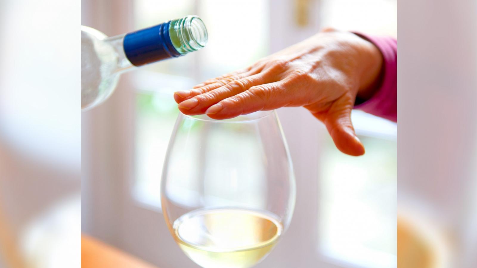 PHOTO: In this undated stock photo, a woman's hand is seen covering her wine glass.