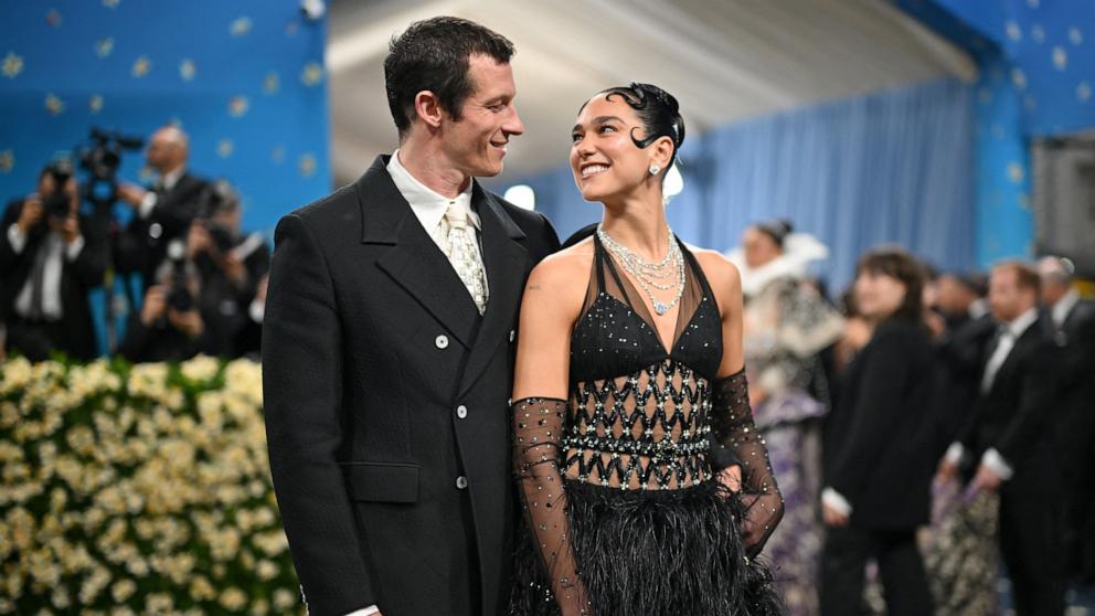 PHOTO: Dua Lipa and Callum Turner arrive for the 2025 Met Gala at the Metropolitan Museum of Art, May 5, 2025, in New York. 