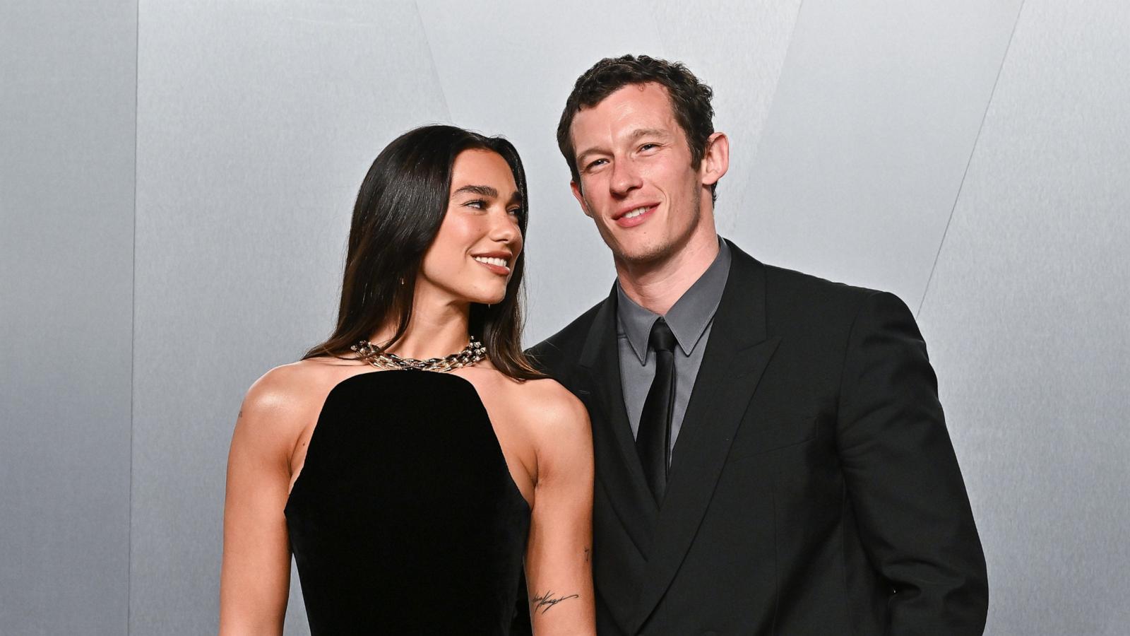 PHOTO: Dua Lipa, left, and Callum Turner arrive at the Vanity Fair Oscar Party, March 15, 2026, at the Los Angeles County Museum of Art in Los Angeles.