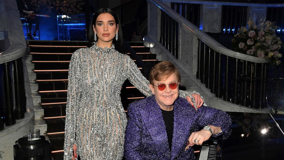 PHOTO: In this April 25, 2021, file photo, Dua Lipa and Sir Elton John attend the 29th Annual Elton John AIDS Foundation Academy Awards Viewing Party.