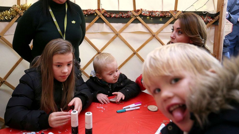 PHOTO: Catherine, Duchess of Cambridge, takes part in Christmas activities with families and children who are supported by the Family Action charity, during a visit to the Peterley Manor Farm in Buckinghamshire, Britain, Dec. 4, 2019.