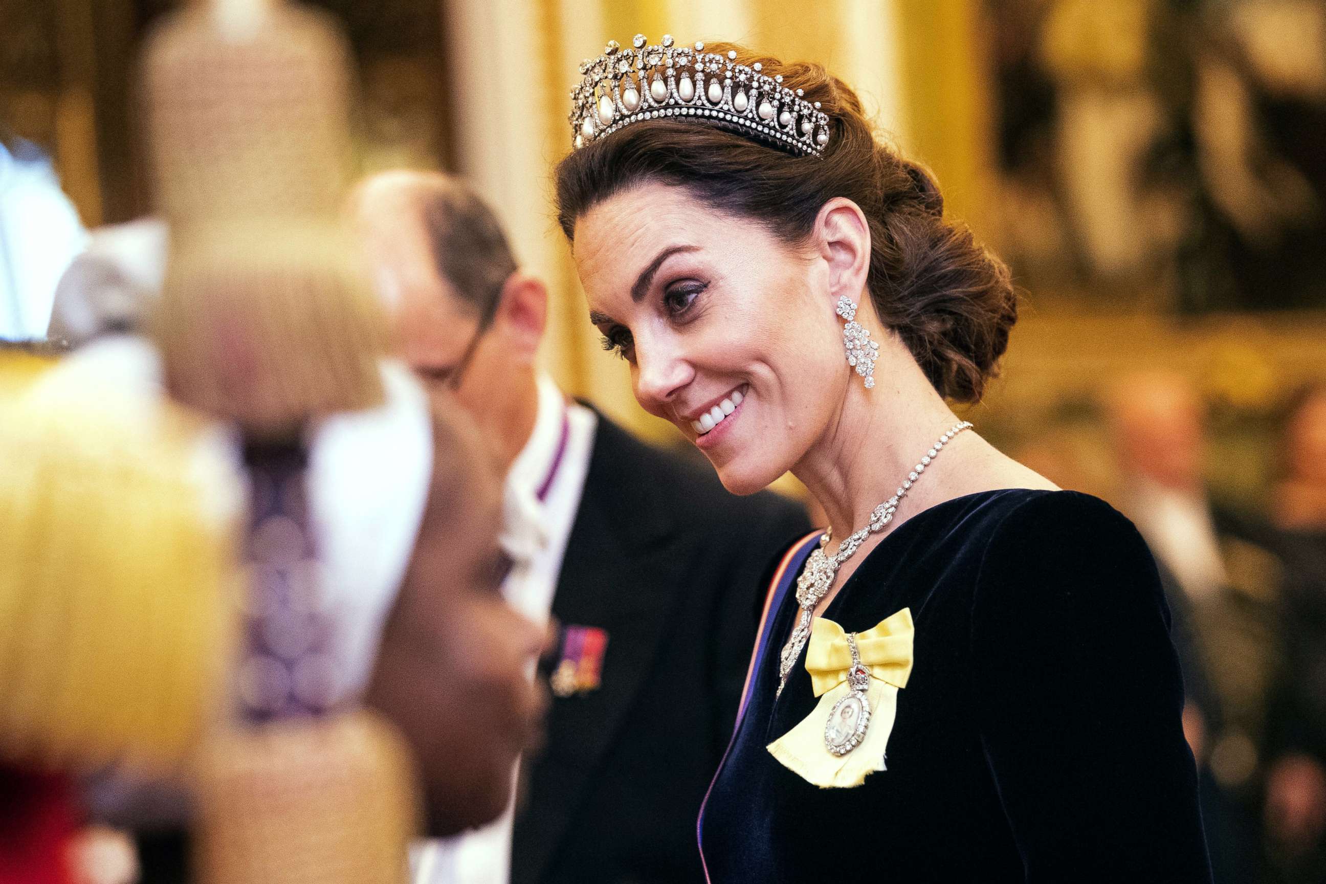 PHOTO: Catherine, Duchess of Cambridge talks to guests at an evening reception for members of the Diplomatic Corps at Buckingham Palace in London, Dec. 11, 2019.