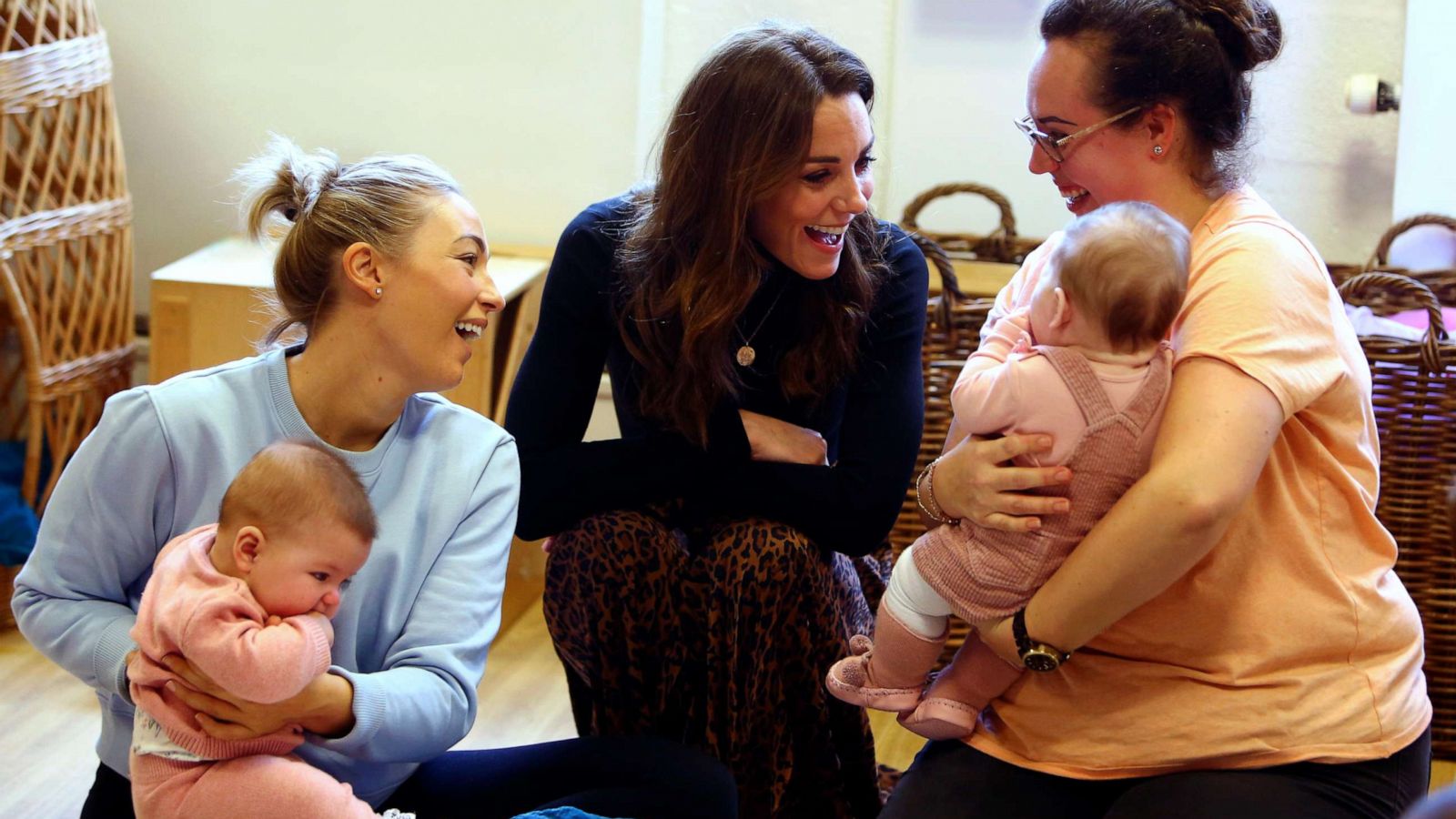 PHOTO: Britain's Kate, Duchess of Cambridge chats with mothers and babies during her visit to the Ely & Caerau Children's Centre in Cardiff, Jan. 22, 2020.