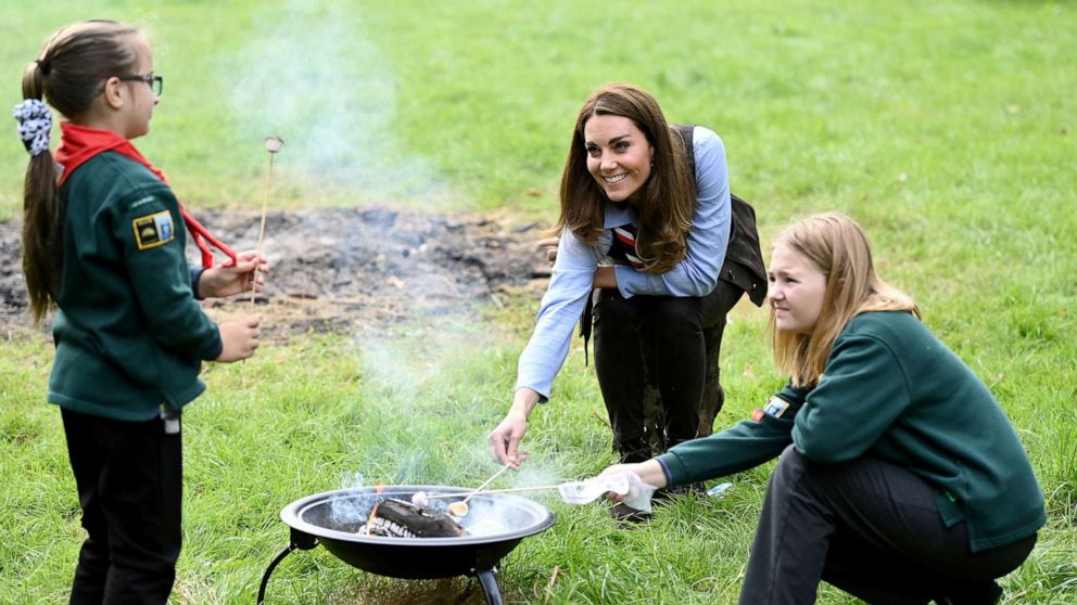 PHOTO: Britain's Catherine, Duchess of Cambridge, toasts marshmallows during her visit to a Scout Group in Northolt, northwest London, Sept. 29, 2020. 