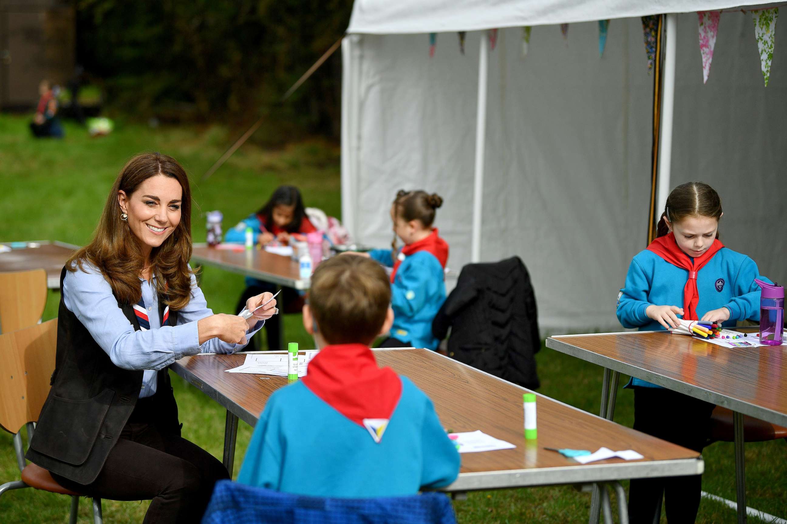 PHOTO: Britain's Catherine, Duchess of Cambridge talks with members of the Beavers as she visits a Scout Group in Northolt, northwest London on Sept. 29, 2020.
