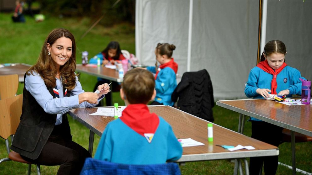 PHOTO: Britain's Catherine, Duchess of Cambridge talks with members of the Beavers as she visits a Scout Group in Northolt, northwest London on Sept. 29, 2020.