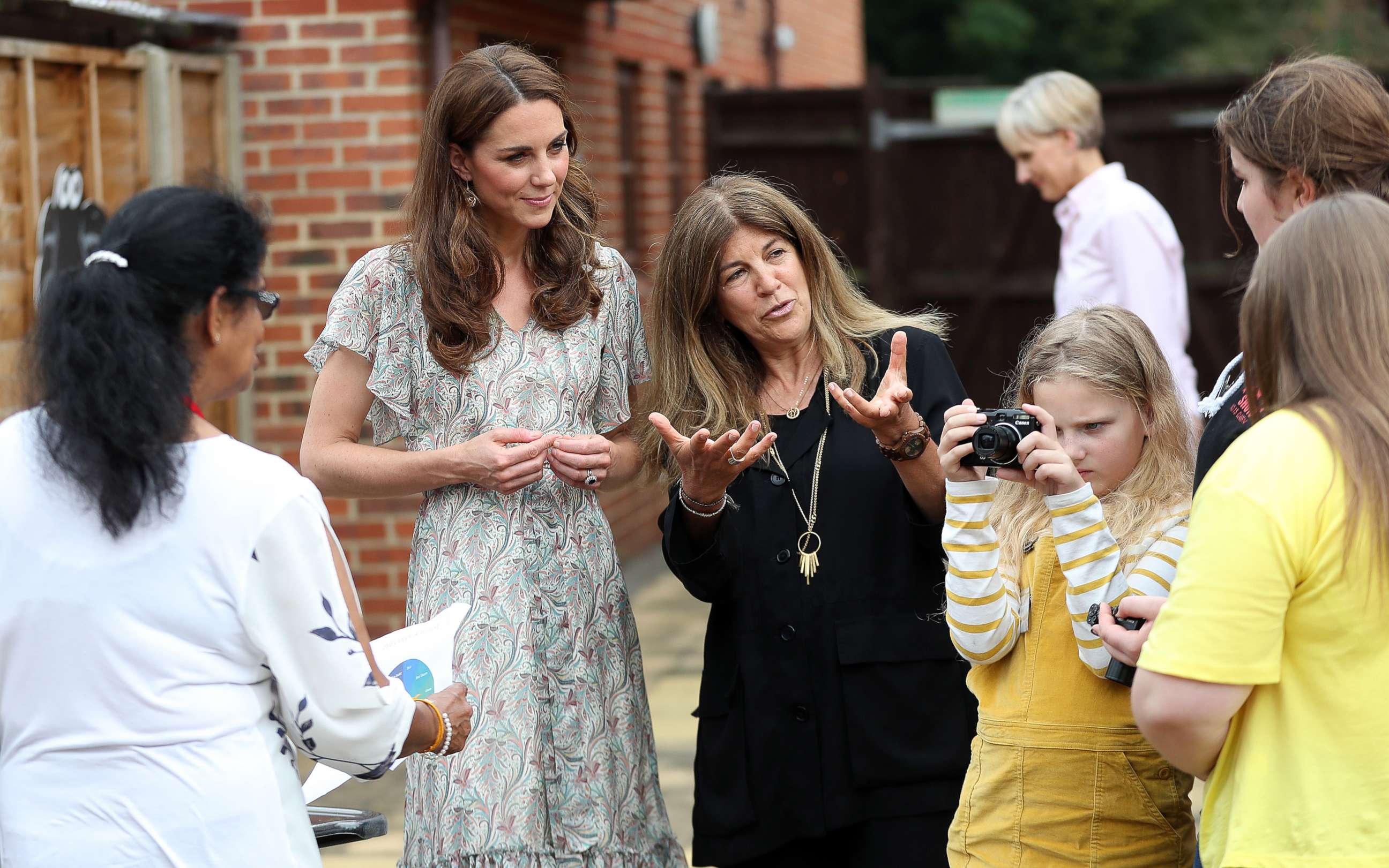 PHOTO: Catherine, Duchess of Cambridge and photographer Jillian Edelstein join a photography workshop for Action for Children, run by the Royal Photographic Society at Warren Park on June 25, 2019, in Kingston, England.