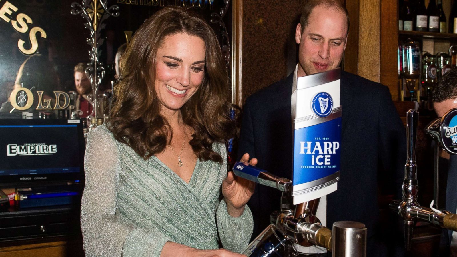 PHOTO: Catherine, Duchess of Cambridge, pours a pint of beer as Prince William, Duke of Cambridge looks on during a visit to Empire Music Hall, Belfast, Northern Ireland, Feb. 27, 2019.