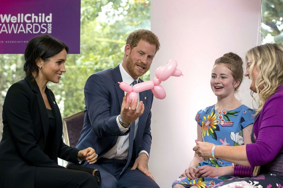 PHOTO: Prince Harry, Duke of Sussex and Meghan, Duchess of Sussex with Poppy and her mother Jayne during the annual WellChild awards at Royal Lancaster Hotel, Sept. 4, 2018, in London.