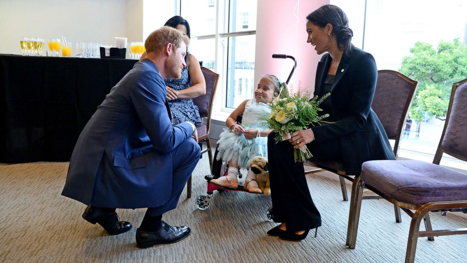 PHOTO: Prince Harry, Duke of Sussex and Meghan, Duchess of Sussex meet 7 year old Matilda Booth during the annual WellChild awards at Royal Lancaster Hotel, Sept. 4, 2018, in London.