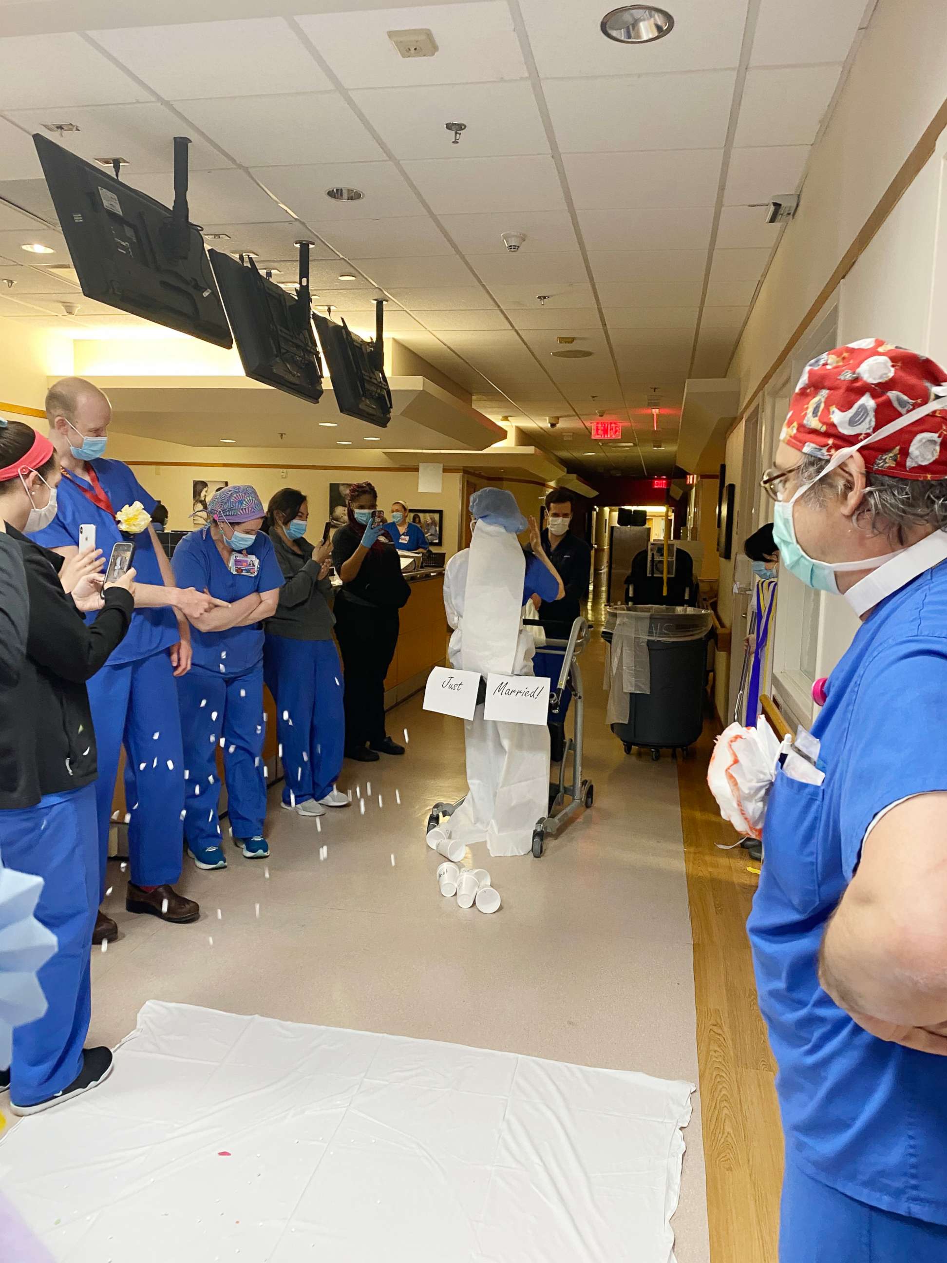 PHOTO: Dr. Shelun Tsai's "wedding" processional was on a transportation cart decorated by colleagues and friends and adorned with "Just Married" signs, at Duke Health in Durham, N.C., April 11, 2020.