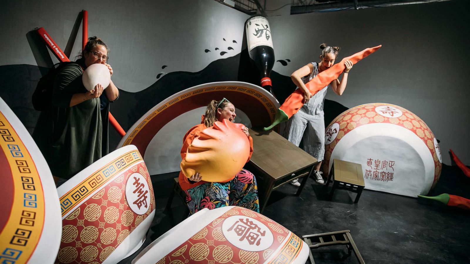 PHOTO: People pose in a room at the pop-up museum Dumping & Associates in Los Angeles.