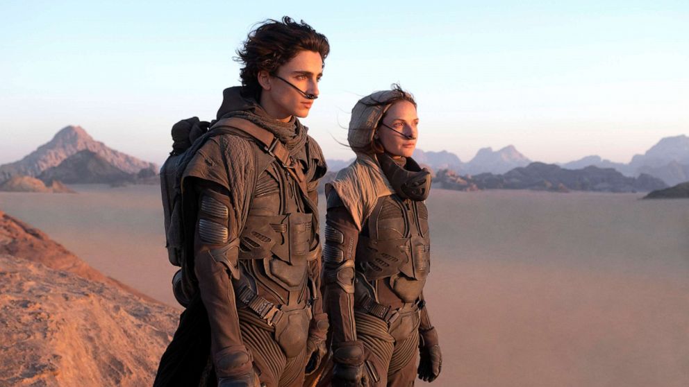 PHOTO: Timothee Chalamet and Rebecca Ferguson perform in a scene from "Dune".