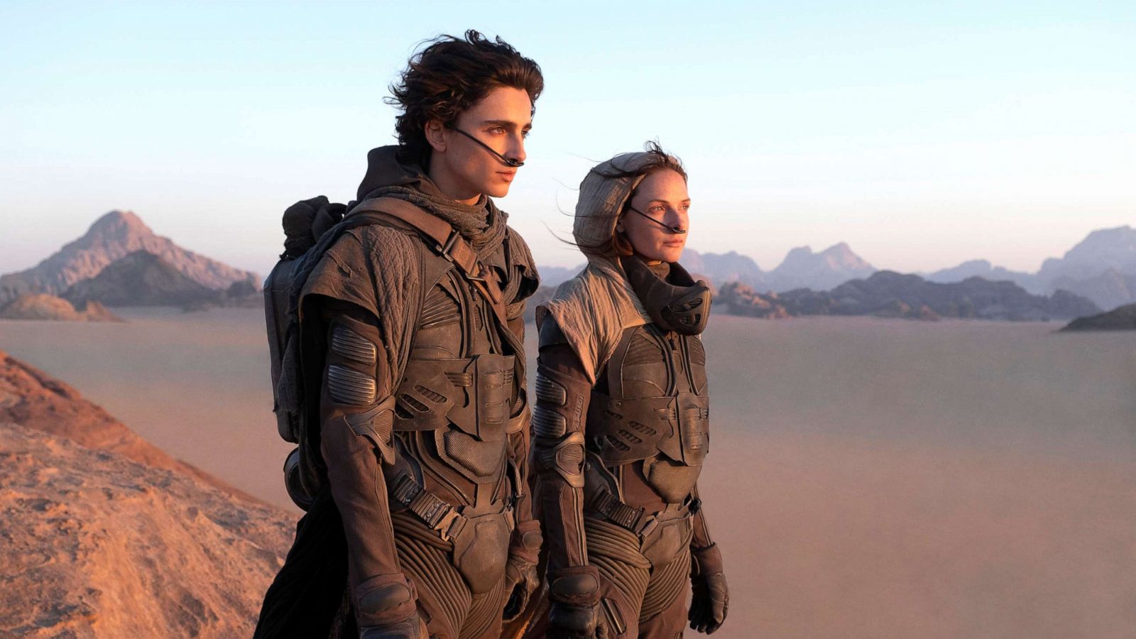 PHOTO: Timothee Chalamet and Rebecca Ferguson perform in a scene from "Dune".