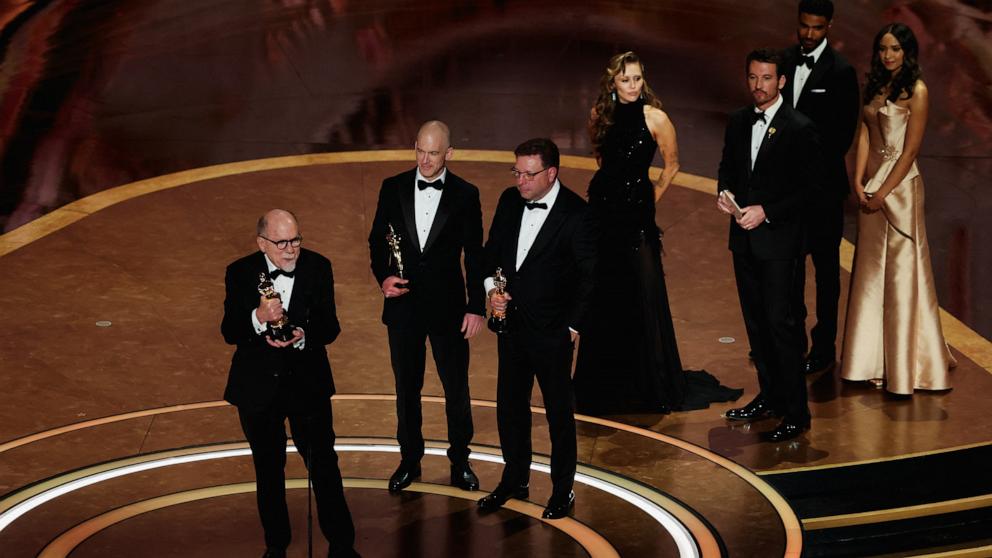 PHOTO: Gareth John, Richard King, Ron Bartlett and Doug Hemphill win the Oscar for Best Sound for "Dune: Part Two" during the Oscars show at the 97th Academy Awards in Hollywood, March 2, 2025. 