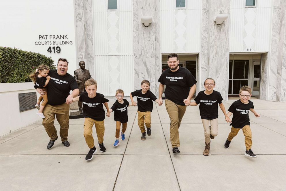 PHOTO: Dustin and Daniel Johnson, of Florida, are celebrating their first Father's Day after formally adoption six siblings in May 2023.