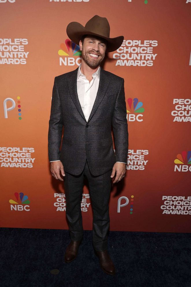 PHOTO: Dustin Lynch arrives to the 2023 People's Choice Country Awards held at the Grand Ole Opry House on Sept. 28, 2023, in Nashville, Tenn.