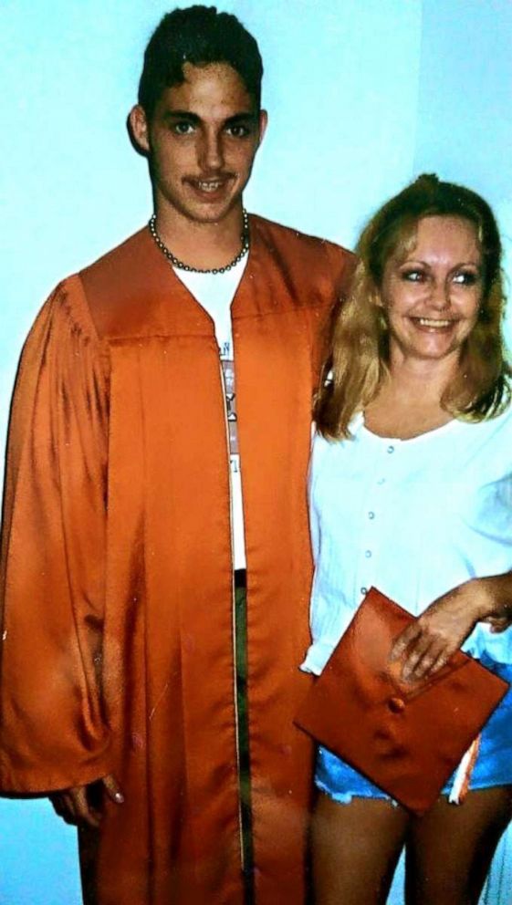 PHOTO:  Justin Dwayne Lee Johnson at his High School graduation with his late mother.