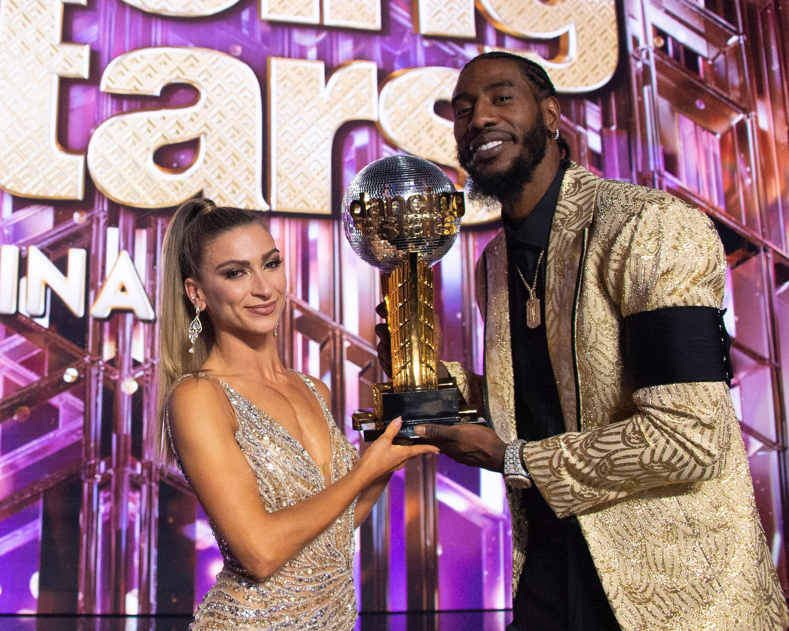 PHOTO: Daniella Karagach and Iman Shumpert hold the Mirrorball Trophy on "Dancing with the Stars," Nov. 22, 2021.