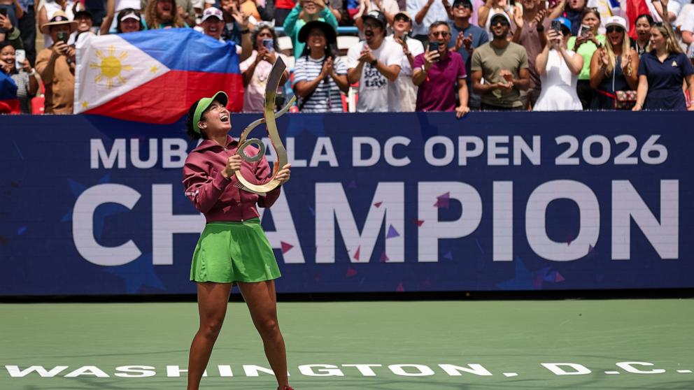 PHOTO: Alexandra Eala holds the Championship Trophy after winning the women's singles championship match against Jessica Pegula at the Mubadala DC Open 2026 at William H.G. FitzGerald Tennis Center on August 3, 2026 in Washington, DC.