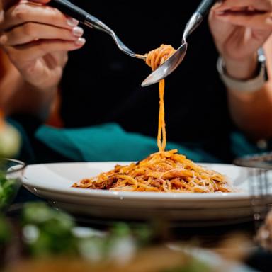PHOTO: Stock photo of a person eating dinner.