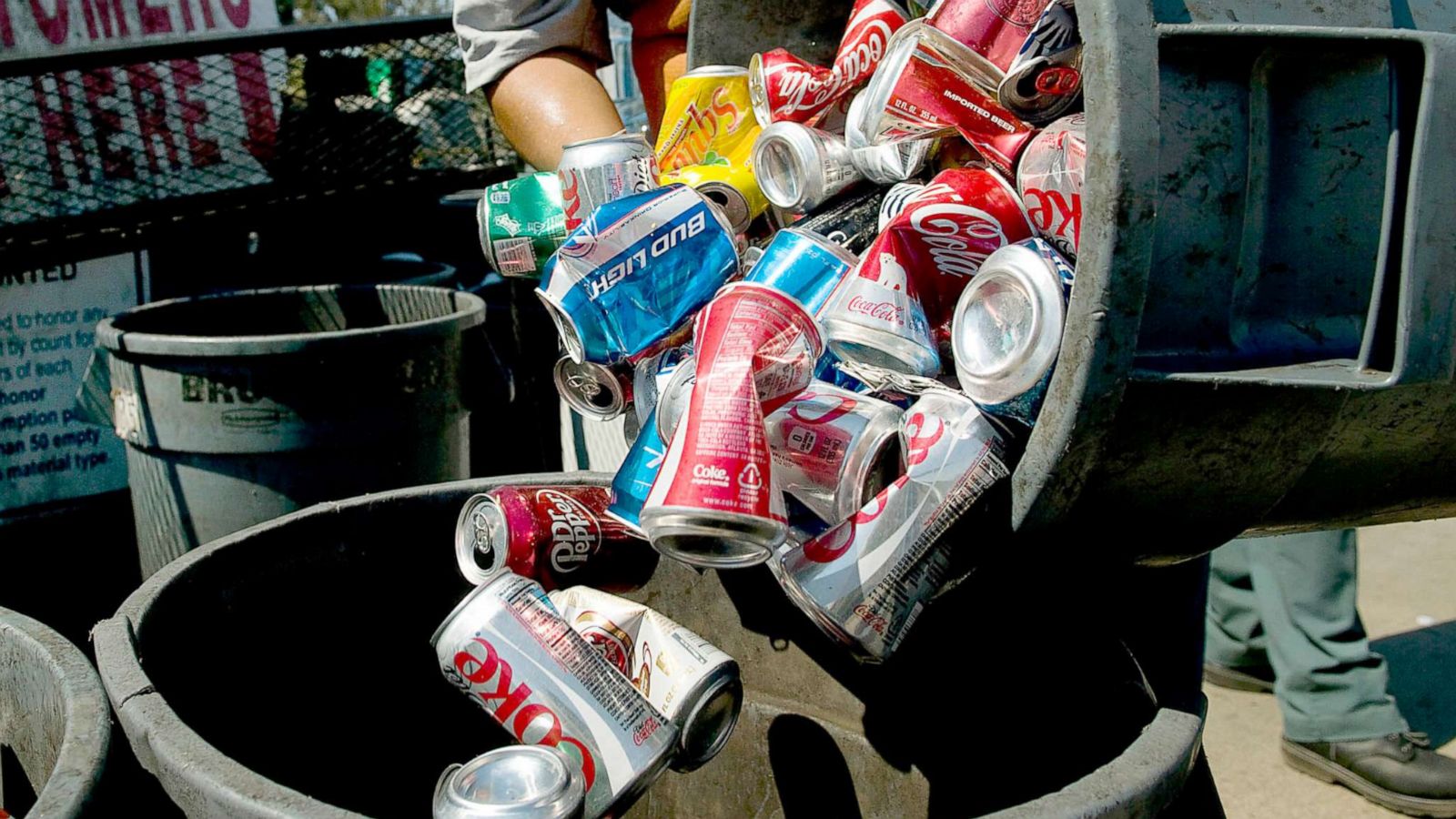 PHOTO: A worker consolidates metal cans at the Miramar Recycling facility in San Diego, Calif., Aug. 13, 2012.